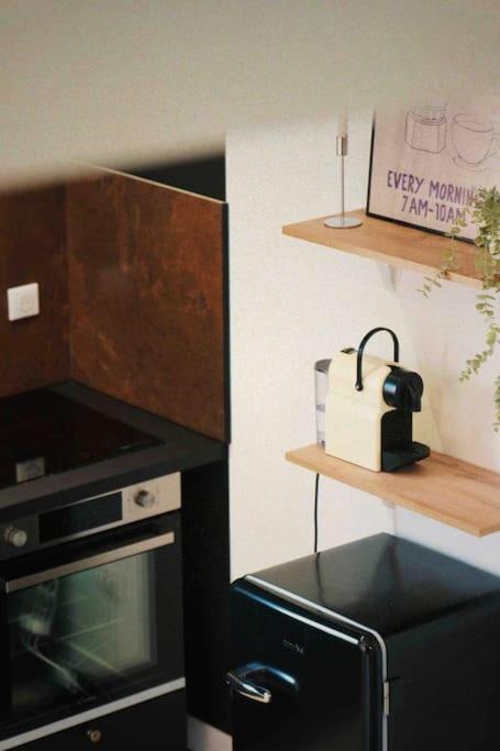 Le 23, Cocon Dans Le Centre Historique Apartment มงโตบ็อง ภายนอก รูปภาพ